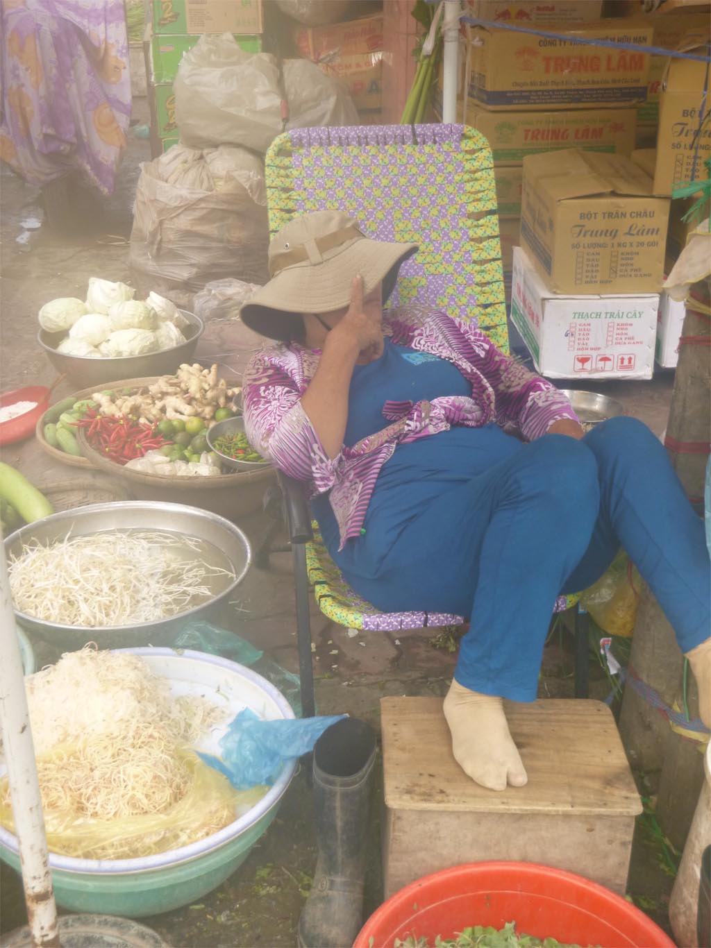 A sleepy market lady